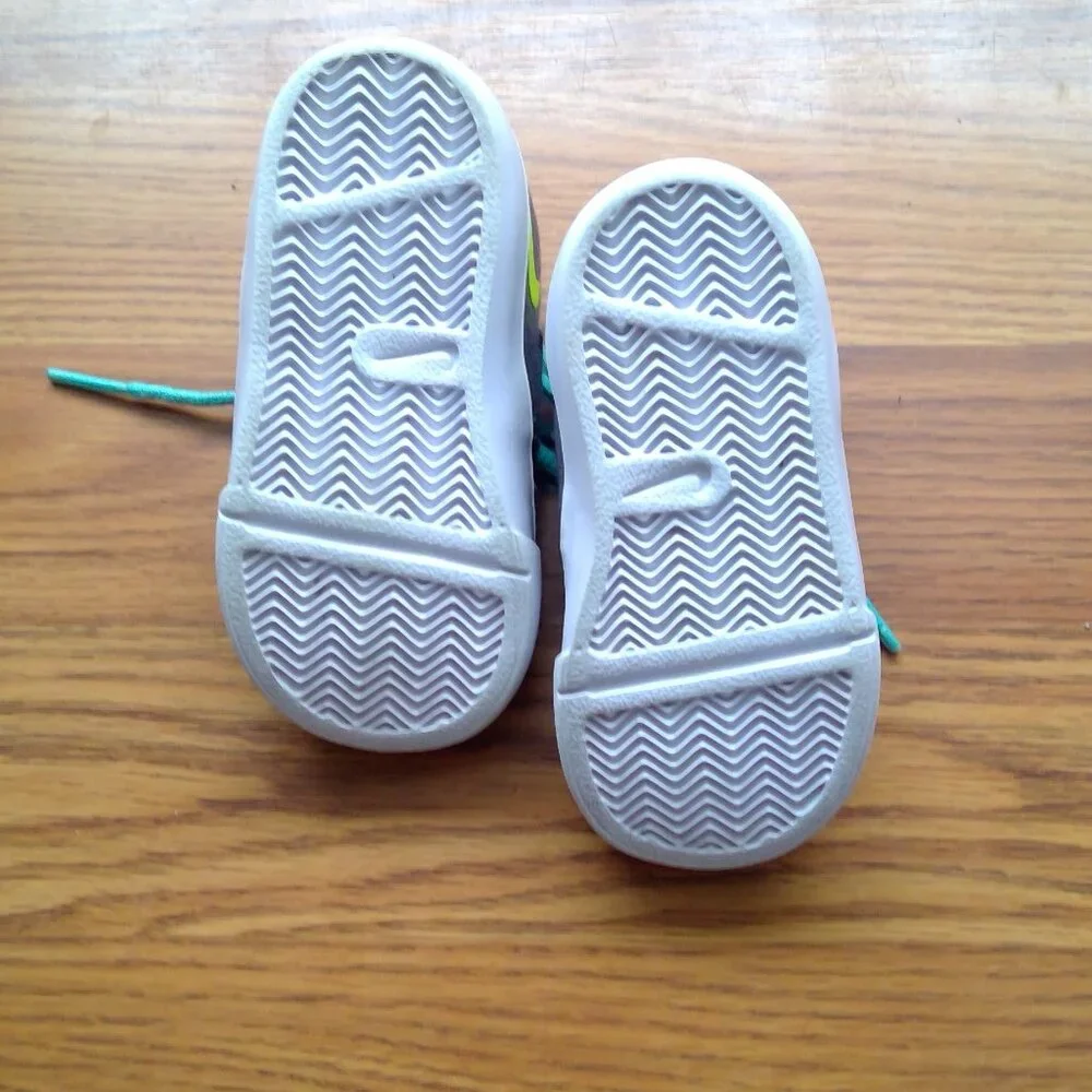 Nike Kids Dark Gray Sneakers with Neon Yellow Swoosh and Teal Laces